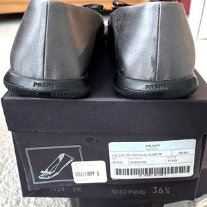 Authentic Prada shoes, 36 1/2 dark silver in color never worn.